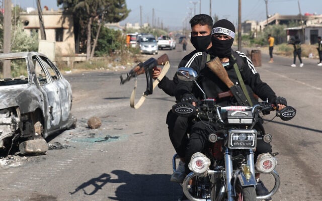 AFP__20250718__678M7KE__v1__HighRes__SyriaConflict-640x400.jpg