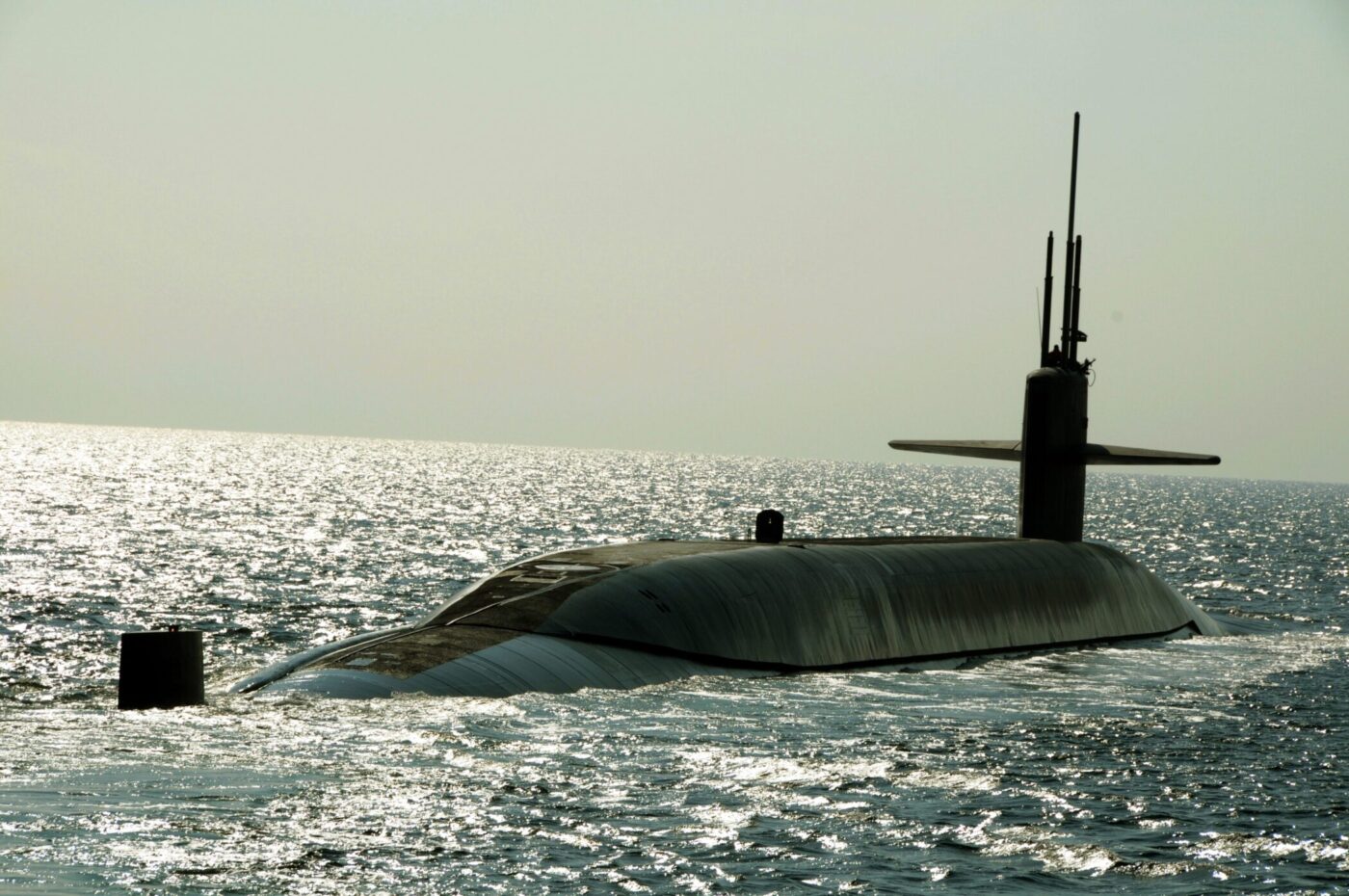 USS Maryland (SSBN 738) (Gold) transits the Atlantic Intercoastal Waterway as it departs Naval Submarine Base Kings Bay, Ga. for a patrol mission, Feb. 15. NSB Kings Bay is the homeport for Ohio class ballistic missile submarines on the east coast.